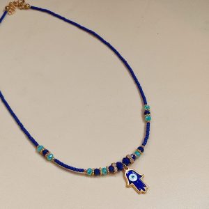 Collar mano hamsa ojo turco azul con dorado